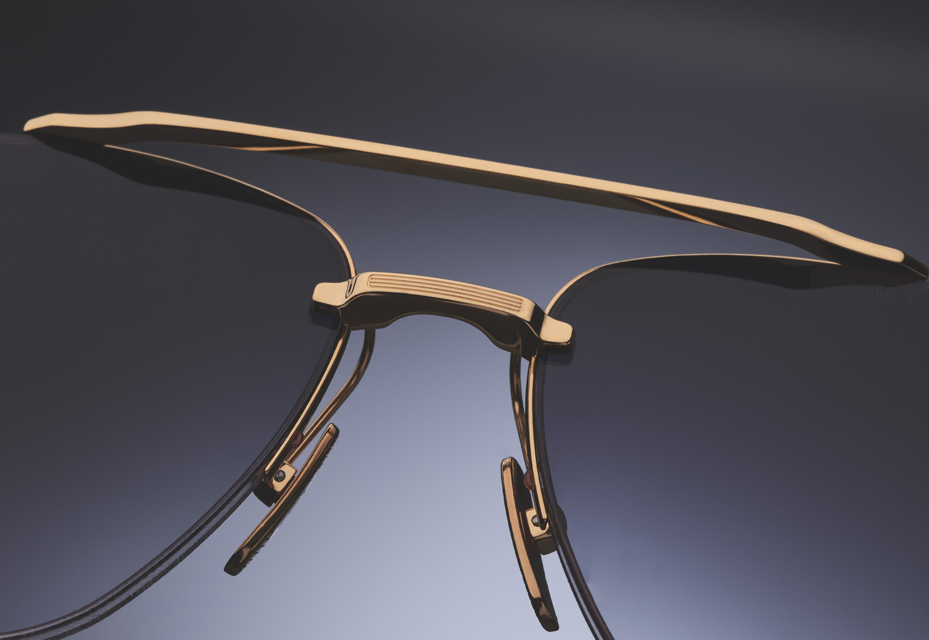 RIMLESS FRAME CONSTRUCTION WITH CUSTOM TITANIUM BROW BAR AND NOSE BRIDGE