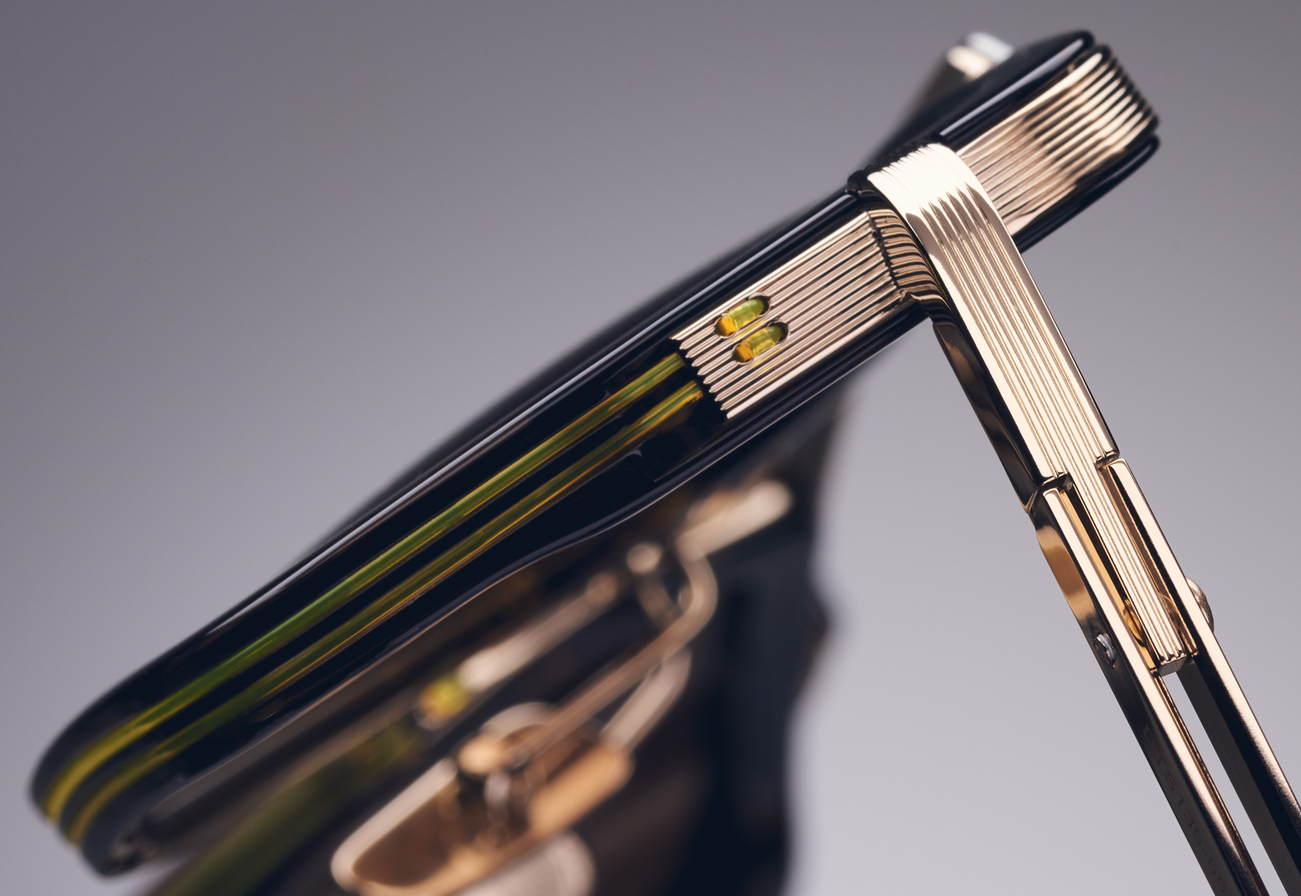 TITANIUM INLAY FRAME WITH PRESS LINE DETAIL