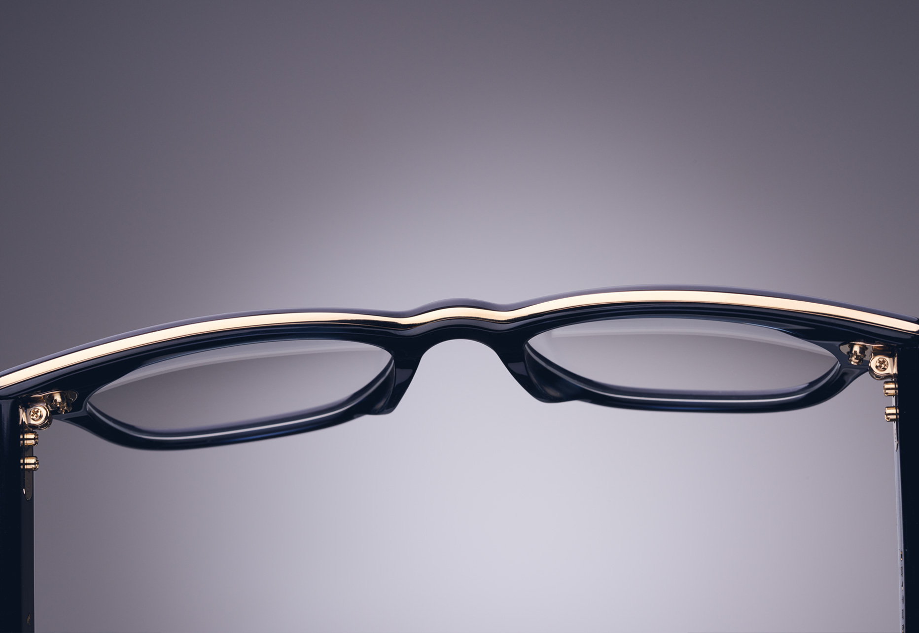 THIN TITANIUM INLAY EXTENDS THE ENTIRE LENGTH OF THE FRAME